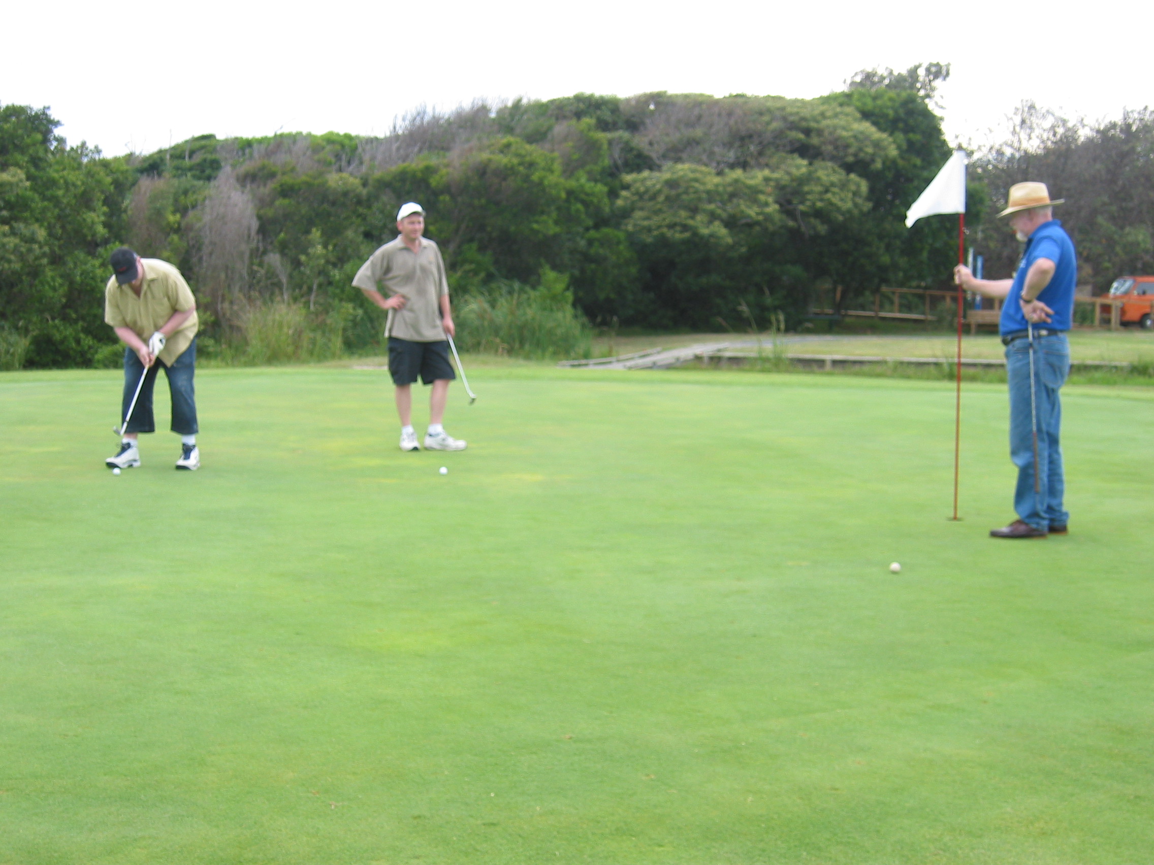 Michael, Brendan & Ken playing golf in Forster