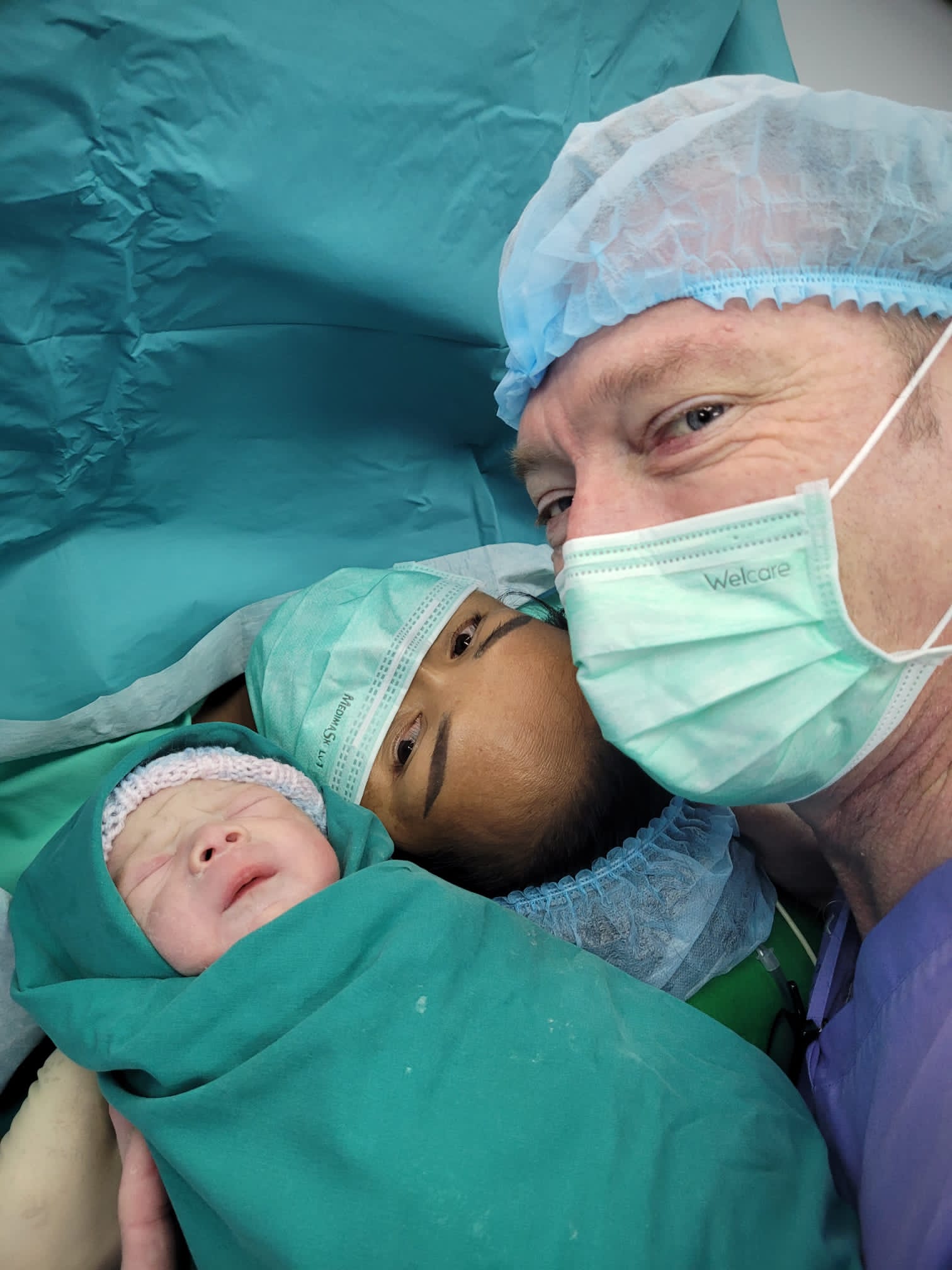 Tar and Michael with newborn Oscar