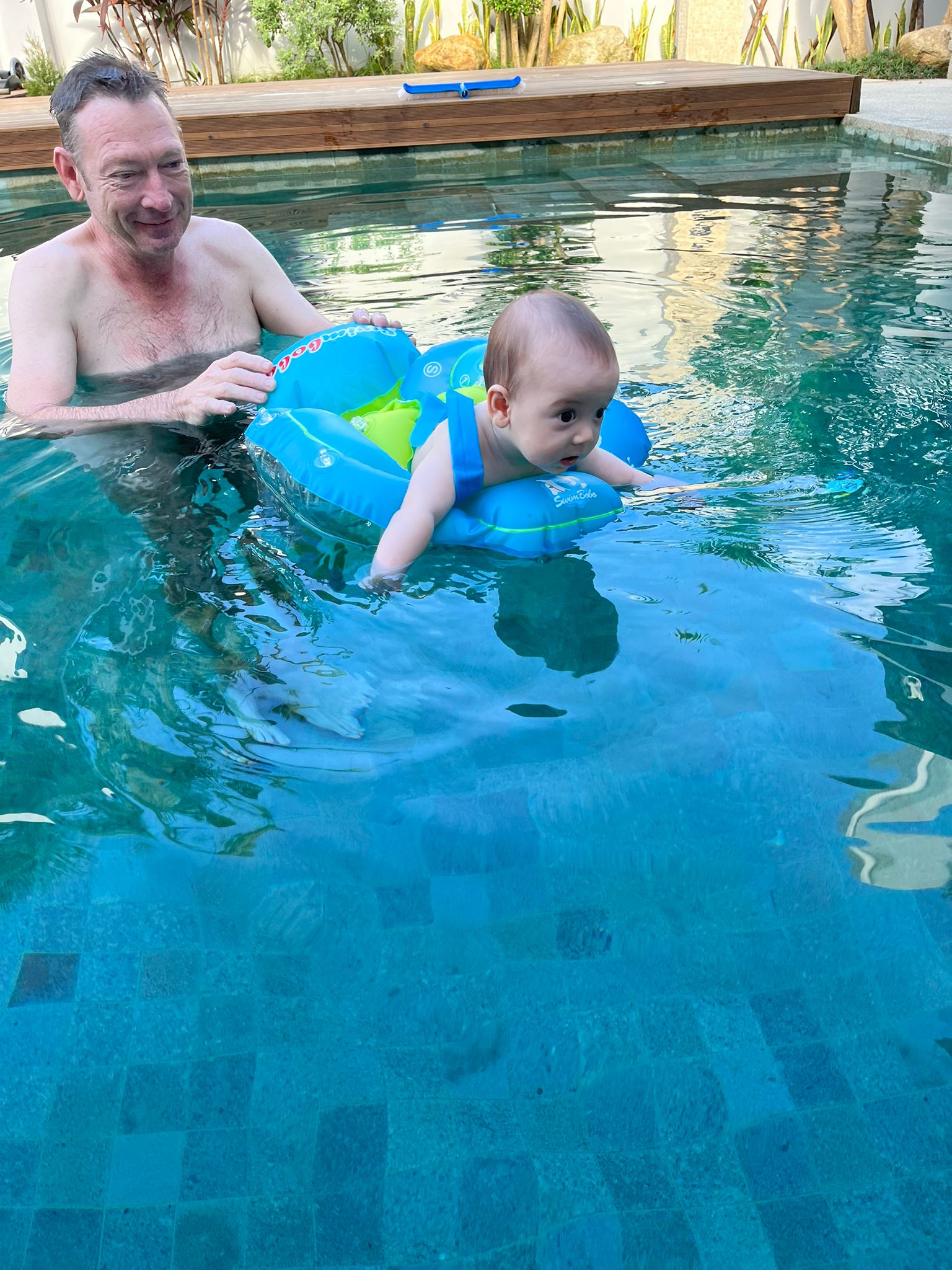 Michael swimming with Oscar at home in Phuket