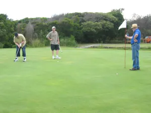Michael, Brendan & Ken playing golf in Forster