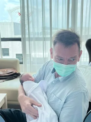 Michael with newborn Oscar