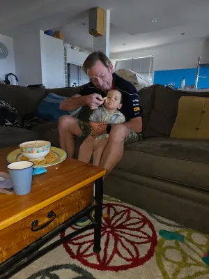 Michael feeding Oscar